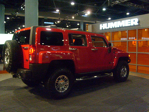 hummer pulling out big truck